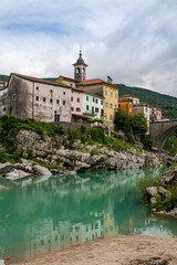 Fototapeta premium Charming Kanal na Soci by the River Soca in Summer, Slovenia