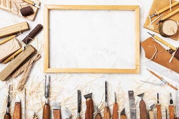 Wood carving tools. Carpentry workshop desk for joinery and woodworking top view.