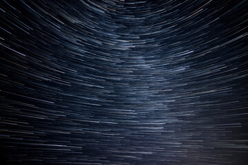 Star tracks of Milky Way galaxy. Movement of stars in the night sky. Night starry sky and Milky Way galaxy.