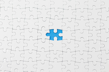 Jigsaw puzzle with one piece missing