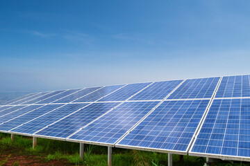solar panels against blue sky background. Photovoltaic, alternative electricity source concept.