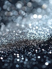 Soft dreamy background with a luxurious shimmering silver glitter surface, beautifully diffused lights creating a bokeh effect