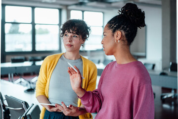 Entrepreneur discussing business strategy in meeting at office