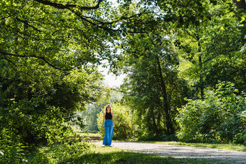 Woman spending leisure time in park
