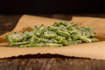 frozen and ice-covered green asparagus beans