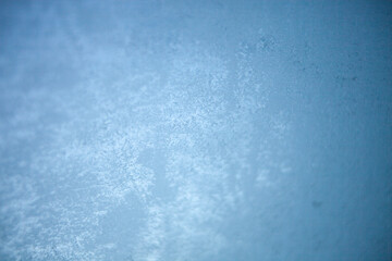 Close-up of frosted glass with icy texture