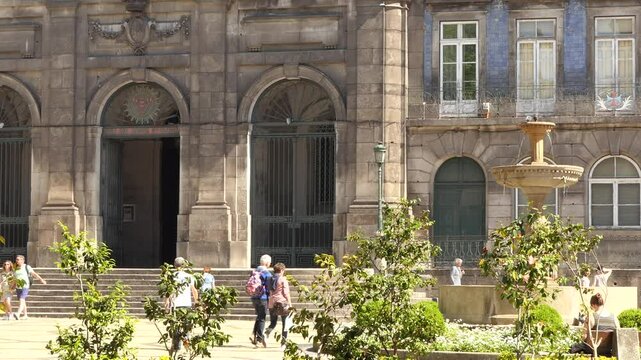 PORTO, PORTUGAL - APRIL 12 2017: Church of Trinity is church in city of Oporto in Portugal, located in Praca da Trindade behind building of City Hall of Porto. It was built of Carlos Amarante.