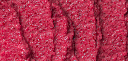 Berry yoghurt ice cream. Smoothies from fresh fruits and berries. Ice cream texture. Delicious sweet dessert close-up as a background.