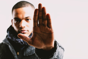 Man raising hand, signaling caution or stop