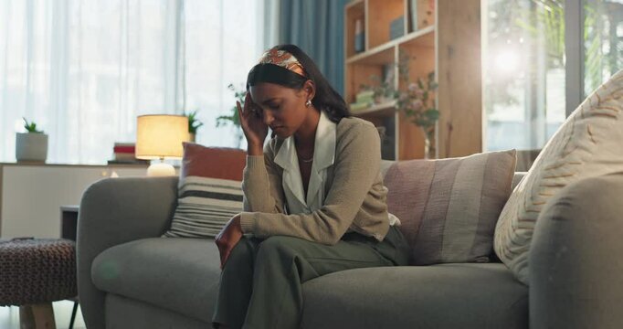 Stress, headache or sad woman on sofa with anxiety, fear and mistake, guilt and worry at home. Mental health, trauma and frustrated girl person overthinking divorce shame, loss or fail in living room