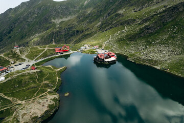 Balea Lake, glacier lake situated at of altitude in the Fagaras Mountains, in Romania, Sibiu...