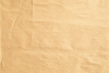 Crumpled and bumpy brown background paper texture