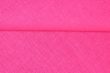 Fototapeta premium pink hemp viscose natural fabric cloth color, sackcloth rough texture of textile fashion abstract background