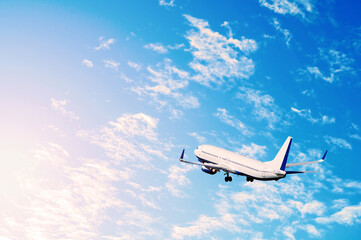Naklejka premium Airplane flying in the sky, travel background - vacation, business trip, and travel by air concepts