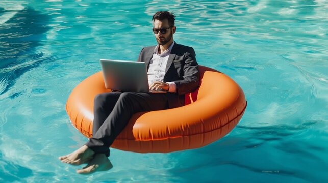 Businessman remote working with computer at swimming pool water. Relax and work, Freelance working online on summer holiday vacation concept.