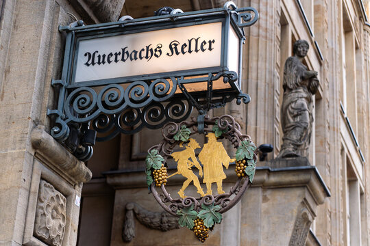 Advertising board for Auerbachs Keller in Leipzig. The most famous, second oldest restaurant in Leipzig. Known from a scene in Faust by Johann Wolfgang von Goethe. Leipzig, Saxony, Germany 07.13.2024