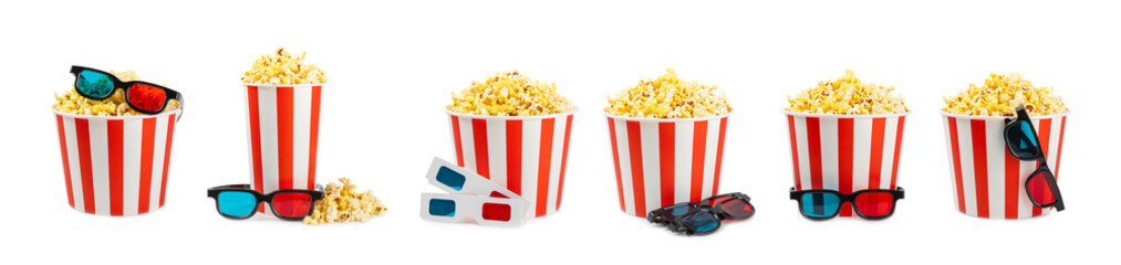 Tasty popcorn in buckets and cold cola drinks with cinema tickets, movie clapper and 3D eyeglasses...