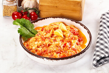 Shakshuka with tomato for breakfast