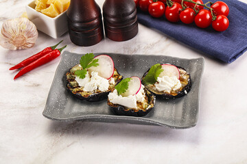 Grilled eggplant with cheese and radish