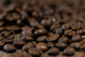 Textured background of freshly roasted coffee beans