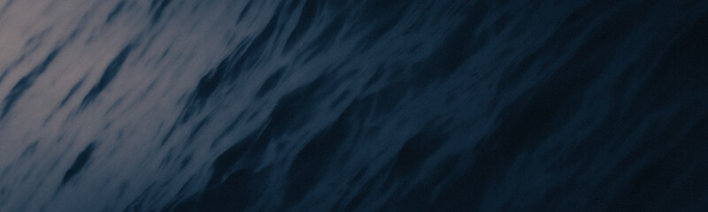 Blue sea water surface texture background with ripples