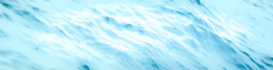 Obraz premium Blue sea water surface texture background with ripples