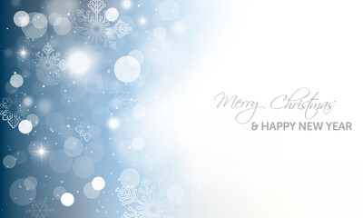 Christmas and New Year Greeting Card with Snowflakes and Bokeh Lights on a Winter Background