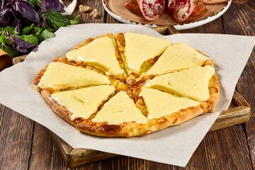 Traditional Imeretian Khachapuri with Cheese Topping, Perfect for Authentic Georgian Cuisine