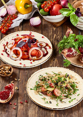 Rustic Arrangement of Traditional Georgian Vegetable Salads with Fresh Ingredients