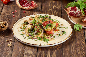 Traditional Georgian Salad with Tomatoes, Cucumbers, and Walnuts - Authentic Caucasus Cuisine