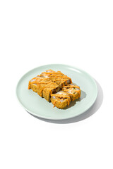 Hot Tempura Salmon Roll with Spicy Sauce on a Plate - Isolated on White Background