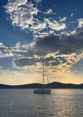 Fototapeta premium sailing ship at sunset