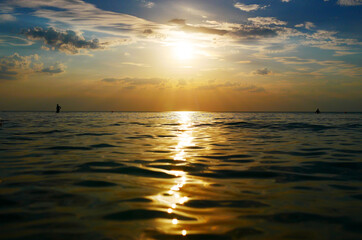 Dramatic blur sunset sky with clouds. Dramatic sunset over the sea