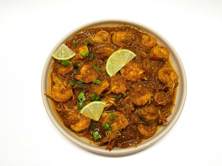 Udang bumbu balado. Shrimp with spicy chili sauce isolated on white. Traditional cuisine from West Sumatra, Indonesia. Perfect for recipe, article, catalogue, or any cooking contents.