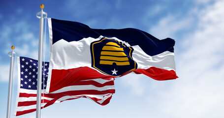 Close-up of the Beehive Flag flag of Utah waving on a clear day