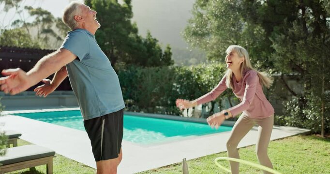 Fitness, hula hoop and senior couple in garden for workout, training or retirement health. Wellness, happy man and elderly woman with equipment for exercise, cardio or hip mobility in backyard