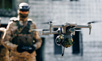 Soldier UAV operator launches army drone with bomb to drop into enemy fortifications and trenches....