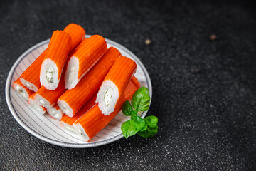 crab stick stuffing cream cheese and herbs natural fresh appetizer meal food snack on the table...
