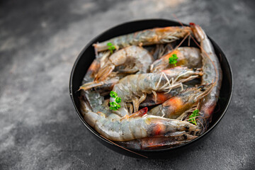 shrimp raw seafood prawns natural food fresh appetizer meal food snack on the table copy space food background rustic keto or paleo diet Pescetarian