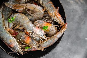 shrimp raw seafood prawns natural food fresh appetizer meal food snack on the table copy space food background rustic keto or paleo diet Pescetarian