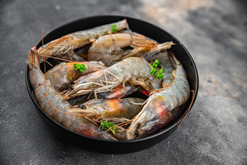 shrimp raw seafood prawns natural food fresh appetizer meal food snack on the table copy space food background rustic keto or paleo diet Pescetarian