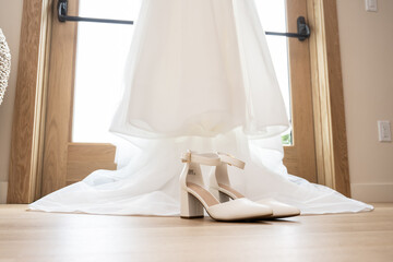 Wedding gown and shoes are a perfect match for this bride's special day