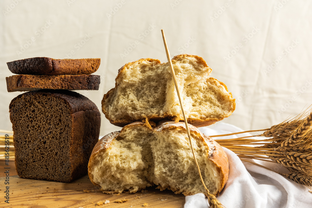 Wall mural broken white bread and wheat