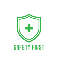 Safety first green shield icon. Vector illustration