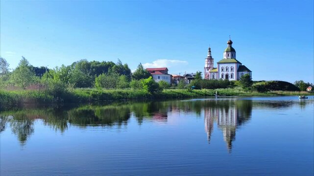 A small old church on the river bank. Suzdal, Russia. The golden ring.	