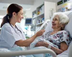 Fototapeta premium Doctor helping a patient lying on a hospital bed, happy faces.