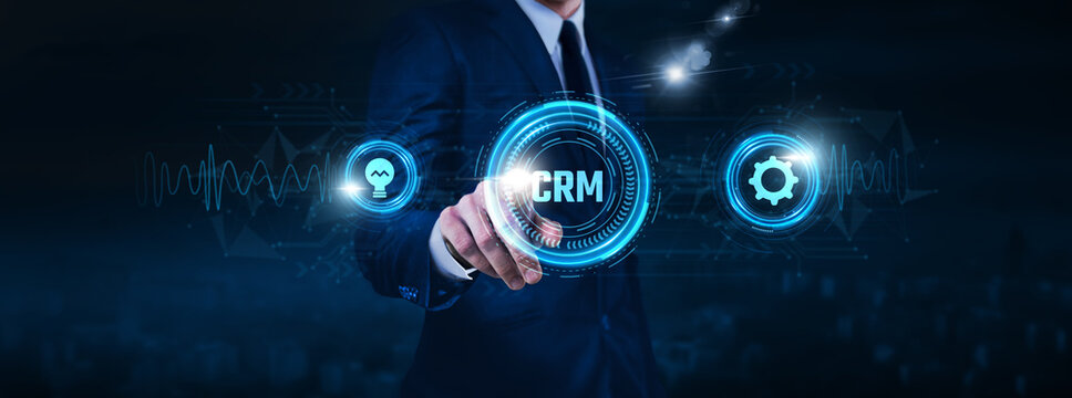 Customer Relationship Management (CRM), software solutions, data analytics, businessman touch of CRM Text Data exchange on digital network connection, customer support systems, sales automation.
