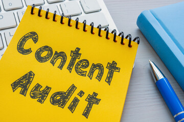 Keyboard and mark about content audit for marketing.