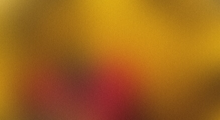 Blurred gradient abstract gold background with a textured surface