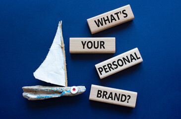 Personal Brand symbol. Wooden blocks with words What is your personal brand. Beautiful deep blue...